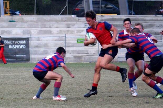 Try-scorer Lochie Dring charges brave tackler