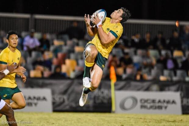 Dylan Riley leaps for the ball