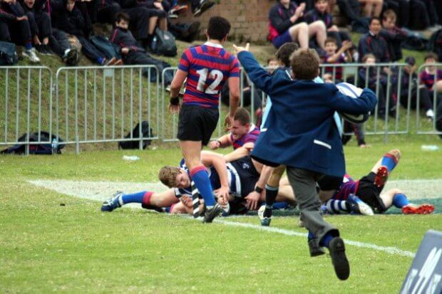 Charles Rorke scores which jubilant fan approves of