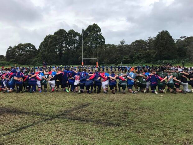 The Parramatta Boys join in a prayer for Lachlan Ward (Image Credit: Sydney Junior Rugby Union). 