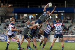 Brumbies' lock, Rory Arnold overbalances as he's lifted to catch the kick off.