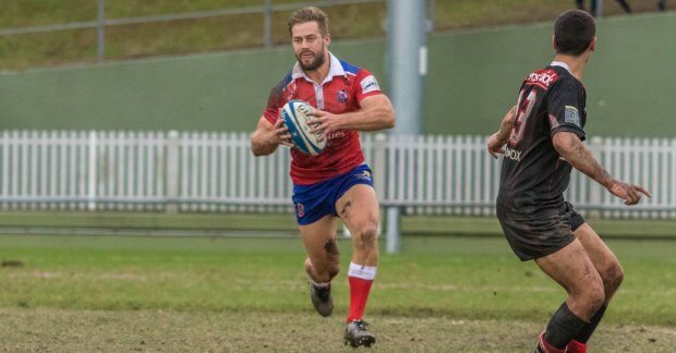 Woodhouse runs the ball against West Harbour (Image Credit - Adam MacDonald)