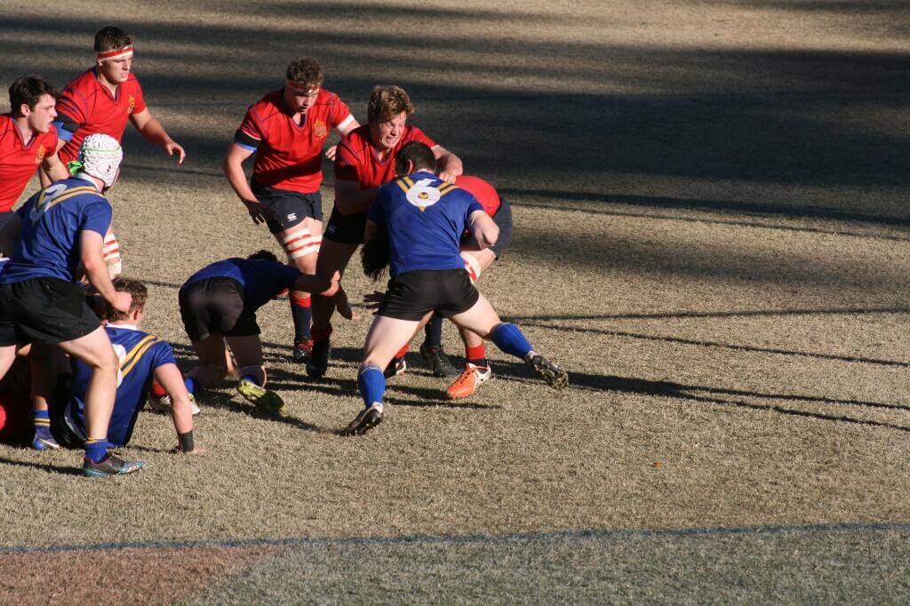 Waverley's Murphy (6) denying Barkers Reimer, Chalmers, and Northcote Photo by Rod Skellet