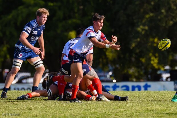 Harrison GOddard clears the ball