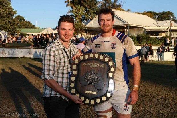 GAGR's own Nick Wasiliev hands over the Horan Little Shield to Rams captain Jed Holloway.