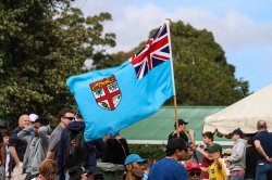 Drua fans flying the Fijian flag.
