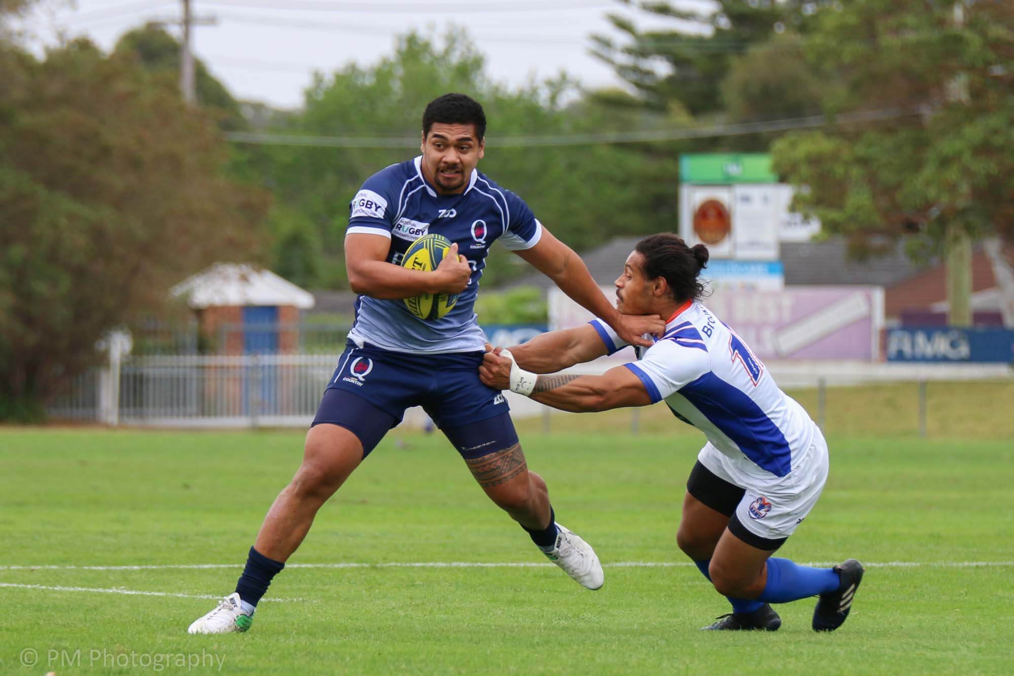 Chris Feaui-Sautia holds back Denis Piligateau.
