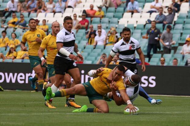 Duncan Paia'aua scoring the first try of the game.