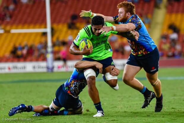 Harry Johnson-Holmes completes a tackle, Waratahs v Highlanders