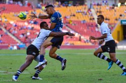 Chance Peni offloads for Brumbies v Fiji