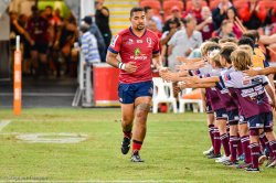 Chris Feauai-Sautia leads the Reds out in his 50th game