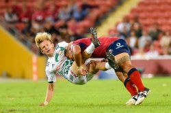 Damian McKenzie tackled by Chris Feaui-Sautia