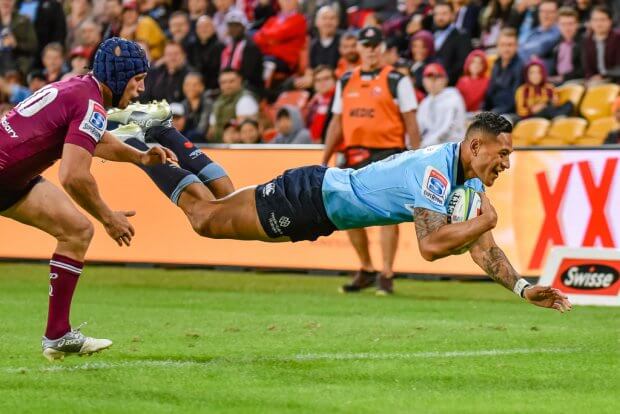 Israel Folau dives over for a try