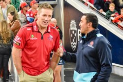 Brad Thorn and Darryl Gibson share a laugh after the game