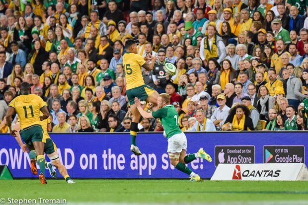 Israel Folau charges down a kick