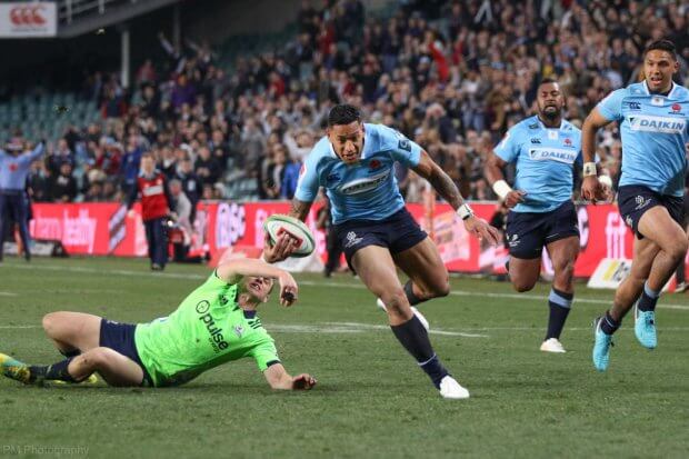 Israel Folau skips past Ben Smith.