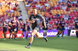 Tom Banks chases a kick