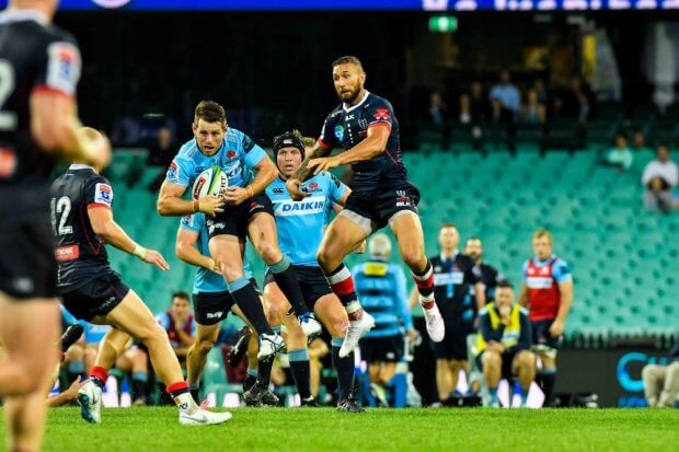 Bernard Foley contests ball with Quade Cooper Waratahs v Rebels 2019 (Credit Keith McInnes)