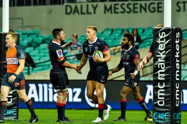 Richard Hardwick, Marika Korobiete congratulate Reece Hodge Waratahs v Rebels 2019 (Credit Keith McInnes)