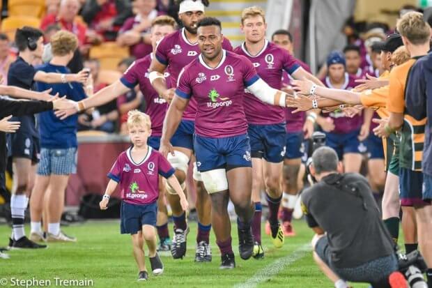 Samu Kerevi leads out the Queensland Reds 