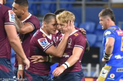 James O'Connor congratulates Tate McDermott on his second try