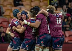 Hamish Stewart embraced post try Reds v Rebels 2020 Super Rugby (CREDIT: Brendan Hertel/QRU)