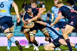 Michael Wells is tackled by Michael Hooper Waratahs v Rebels Super Rugby 2020 (Credit - Keith McInnes Photography)