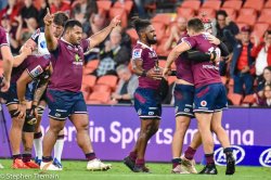 Queensland Reds celebrate their win