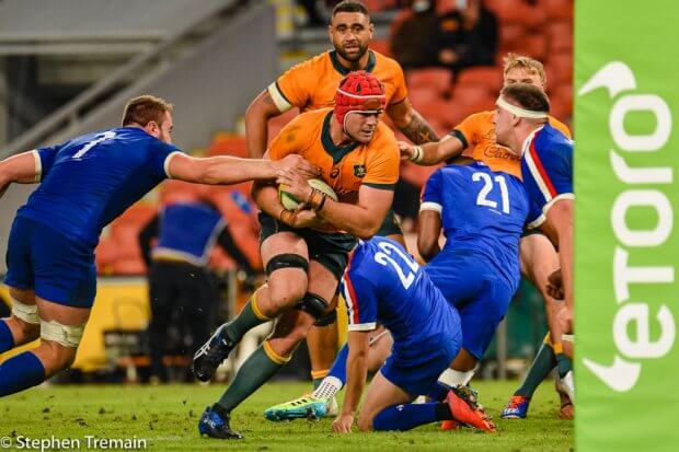 Harry Wilson beats a tackle